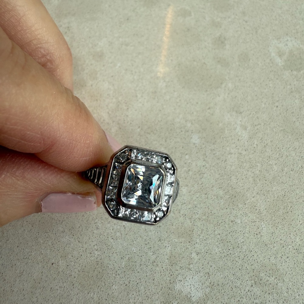 Sterling/925 Lg Halo CZ Ring w/10 Bagets center stone approx 3 carets